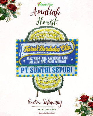 Papan Bunga Duka di Jalan Baru
